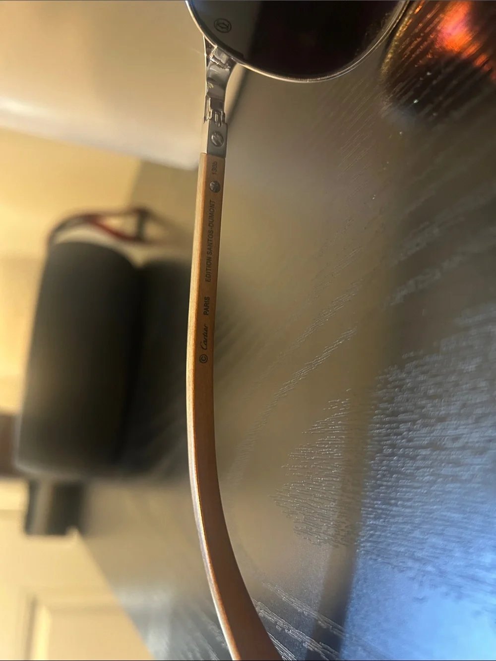 Cartier Silver Frame Sunglasses with Black Lenses and Brown Temples